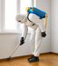 Professional pest control technician providing bed bug cockroach and mosquito fumigation services in Kampala Uganda